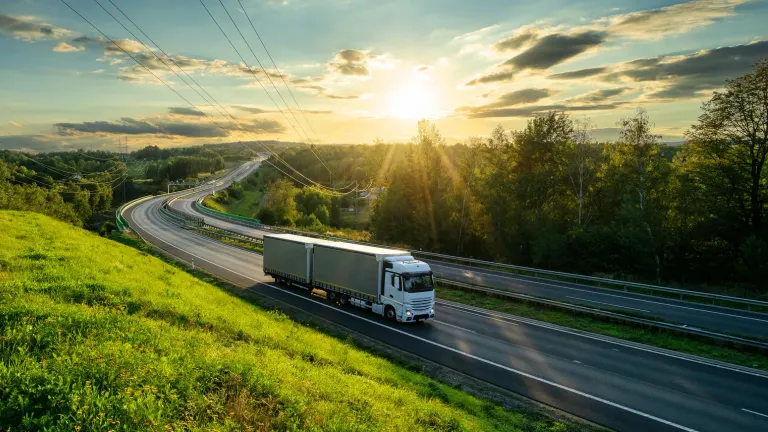 Trucks driving on the highway.