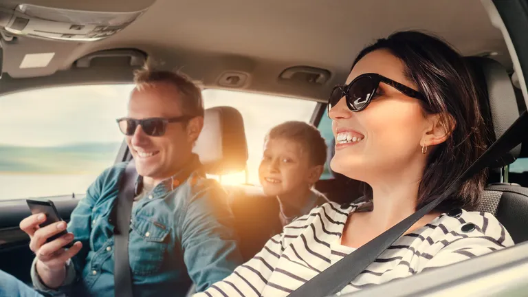 A family driving in the car